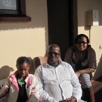 Kalipile Gaxamba with his granddaughters Vuyisa and Lungisa in New Brighton last July. (Photo: Eryn Rosenthal)