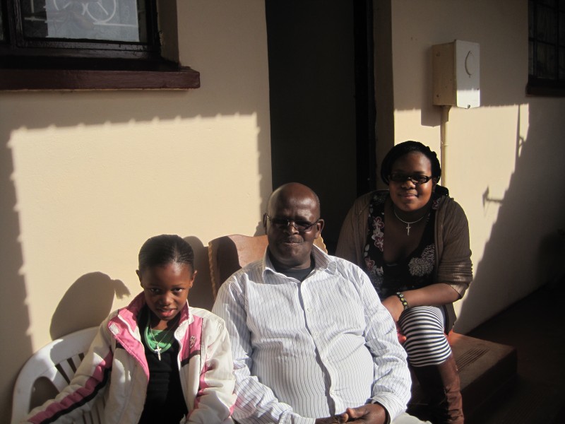 Kalipile Gaxamba with his granddaughters Vuyisa and Lungisa in New Brighton last July. (Photo: Eryn Rosenthal)